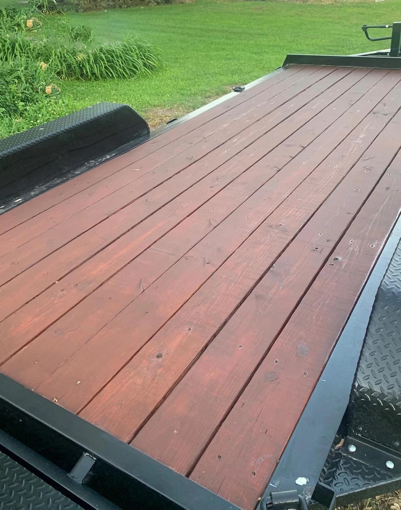 Equipment trailer wood deck protected by Apitong Oil