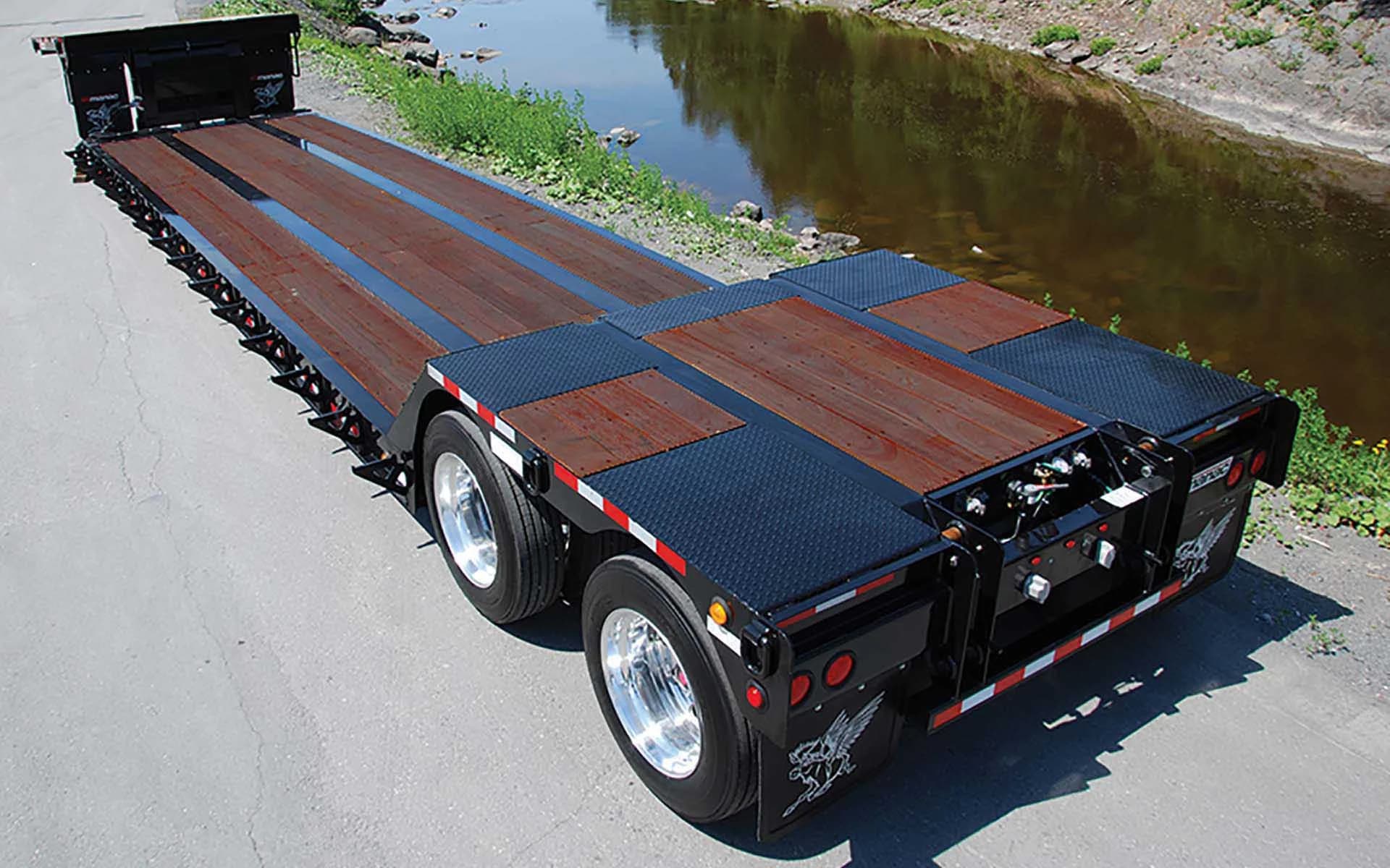 Manac flatbed trailer with wood decking finished in Apitong Oil