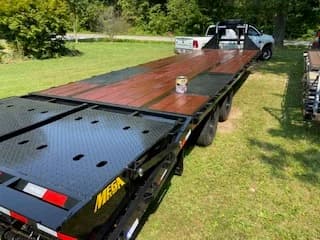 Trailer finished with APITONG OIL